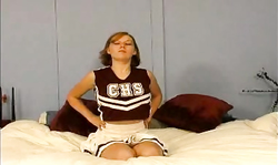Hot cheerleader is getting topless in a truly sweet way
