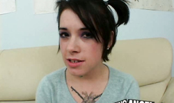 Emo Schoolgirl with pigtails takes off her black bra to show boobs