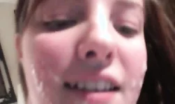 Small-boobed babe is getting load of sperm on her face