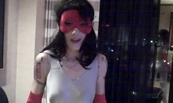 Masked spandex girl shows off her sexy slender body