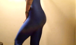 Awesome long-legged mademoiselle poses in blue spandex