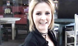 Blonde in black shirt is giving a passionate blowjob