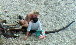 Awesome topless babe and her boyfriend spotted on the beach