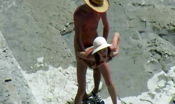 Amazing outdoor beach sex with a slender babe in a white hat