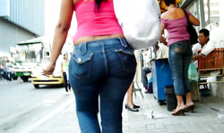 Brunette in pink t-shirt have a round big booty and tight jeans