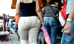 Ebony in white pants is having a very sweet and tight big booty