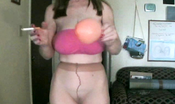 Playful mature in nylons Candi Curves is getting topless