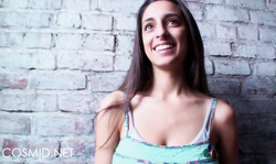 Dark-haired Cosmid lady poses sexy in blue bikinis