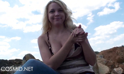 Smiling Cosmid chick with pretty face goes topless outdoors