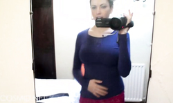 Busty Cosmid babe shows off herself in sexy red lingerie