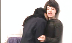 Beautiful lesbians brunettes are enjoying kissing each other