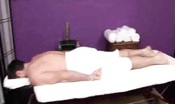 Smiling Massage Parlor beauty is getting naked for client