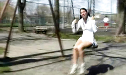 Nice-looking kinky girlfriend swings and shows how long her legs are