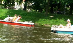 Relaxed lass with big tits and hairy pussy floats in a boat