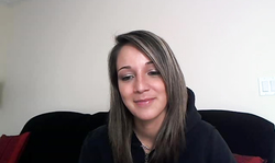 Playful Nikki Sims is getting topless after quick pose session