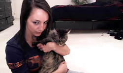 Curvy hottie Nikki Sims is lying on the floor and undressing