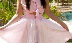 Dream girl with stunning boobs slowly goes topless under the baking sun