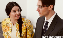 Dark-haired lady is taking care of a Mormon businessman