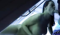 Hot-shaped Queeny Love gives a blowjob in the tanning saloon