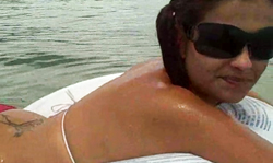 Toned gf demonstrates her massive naked tits in the sea