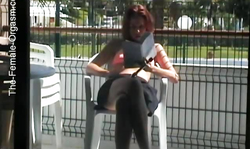 Crazy-minded redhead chick masturbates on the balcony