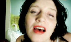 Perfect-looking brunette enjoys tongue fetish in close-up