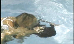 Two sensual babes are dancing underwater and showing their sexy bodies