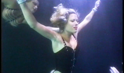 Two elegant chicks with awesome asses are dancing underwater