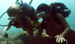 Sweet Underwater action featuring two big-boobed ladies