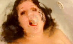 Beautiful brunette in red bra is playing with her pussy Underwater