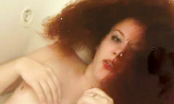 redhead mademoiselle with small tits masturbates Underwater