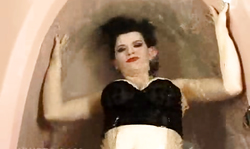 Brunette with enhanced tits and red lips is soloing Underwater