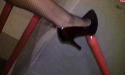 Brunette on high heels Aische Pervers sucks a dick in the porch