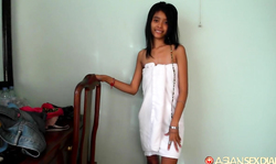 Thai hooker with huge tits fucks in the doggy style