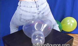 Awesome tattooed brunette jumps on her lovely balloons
