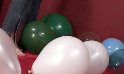 Busty brunette in tight black jeans and her lovely balloons