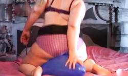 Fat amateur BBW is sitting on a big blue balloon in the bedroom