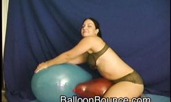Stunning big-bottomed brunette in see-through panties adores balloon fetish