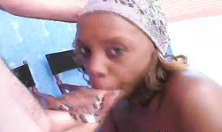 Busty ebony gives her first interracial blowjob in close-up