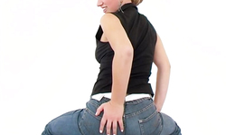 Working girl in tight jeans shows the skills of her butt