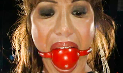 Busty ball-gagged slut Ava Devine loves dirty wet games