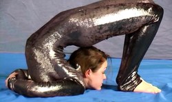 Astonishing young gymnast in latex shows her hot body