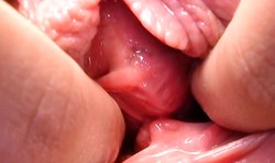 Sweet chick opens her pink crack in the close-up angle