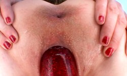 Sensual blondie rides her lovely red dildo in cowgirl pose