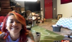 Tattooed redhead Asian Kimberly Chi stimulates her snatch
