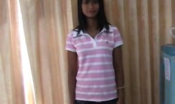 Dark-haired Asian babe stimulates her little crack in the bed