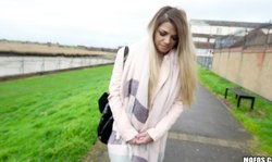 Elegant blonde Bella Scaris sucks outdoors without being shy