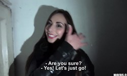 Smiling brunette with red lips Carla Cross performs a sweet head